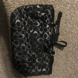 Black and silver coach purse - excellent condition .